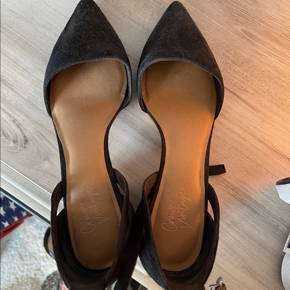 Slight heel with strap around ankle